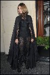 Carine Roitfeld in a lace catsuit.jpg