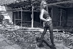 teen assessing tornado damage-L.jpg