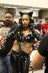 catwoman.girlwatching guy in the background.jpg