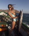 instead of a fisherMAN we have a spear<br />fisherwoman....LOL<br />thats a very fresh wahoo that will be served for dinner