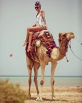 now thats a look ive never ever posted and may not be seen again in years...in Egypt wearing a neoprene one piece atop a camel