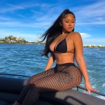 definitely a 'way more awesommer' asian with a hint of ebony<br />that made her stand out with the 2 gentlemen watching her...LOL