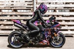 if you are into badass biker girls ive got the hottest one you can find pictured here<br />and no thats not leather...it looks thicker lycra i wonder if its specially made<br />for motorcycling outfit; my sense is no its unbranded; i will investigate it