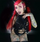 she posted 'everyday is halloween'<br />her out fit is perfectly suited for those sunday oakland raider home games at the old Coliseum's BLACK HOLE were they played until last year