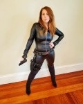 if memory serves me correct i may have posted her already-this picture and one or 2 others with gun in hand-i did not know her source at that time
