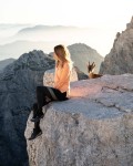 legins w a view 'GIRLWATCHING' from what is obviously going to be a MALE mountain goat...LOL shes laughing/smiling knowing shes been watched