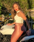 she also wears a pure black disco pants while on/around a bike  BUT i will post those in the disco pants section so you will have to wait or visit her site now