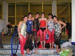 swim team members in hoses fun.jpg
